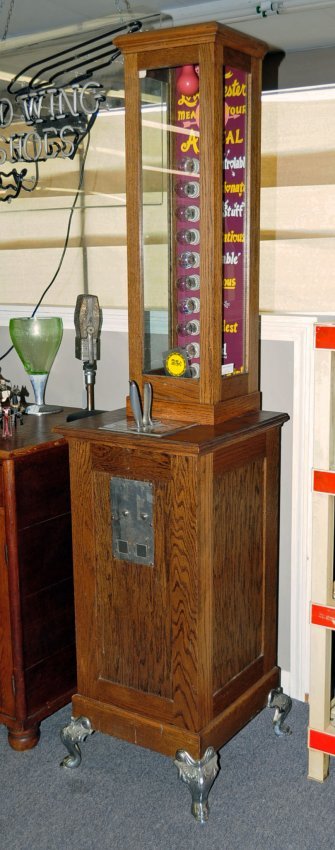 25 Cent Love Tester Coin-Op Oak Floor Model Love Meter: 25 Cent Love Tester Coin-Op Oak Floor Model Love Meter, Circa 1970's. Has chrome plated antique style cabriole feet and squeeze handle. One piece unit measures 78" high x 19" x 20.5" at base. A must f