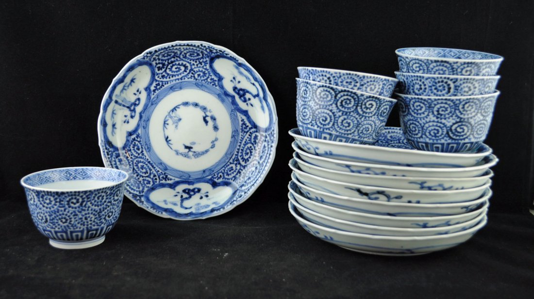Antique Chinese Export B/W Cups & Saucers: Nine fine antique Chinese 4 character marked blue & white porcelain hand painted saucers and six unmarked teacups. Cups measure 2.25" H X 3.25" Dia. And plates 6.5" Dia.