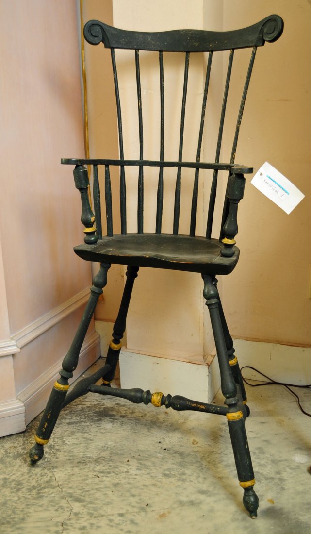 Windsor Style Childs Highchair in Green Paint: Windsor Childs Highchair in Green Paint, Unknown Age. Mr. Stevens had the chair tagged to be an antique but it could be a very clever reproduction. 42.5" H. X 23" W. X 17" D.