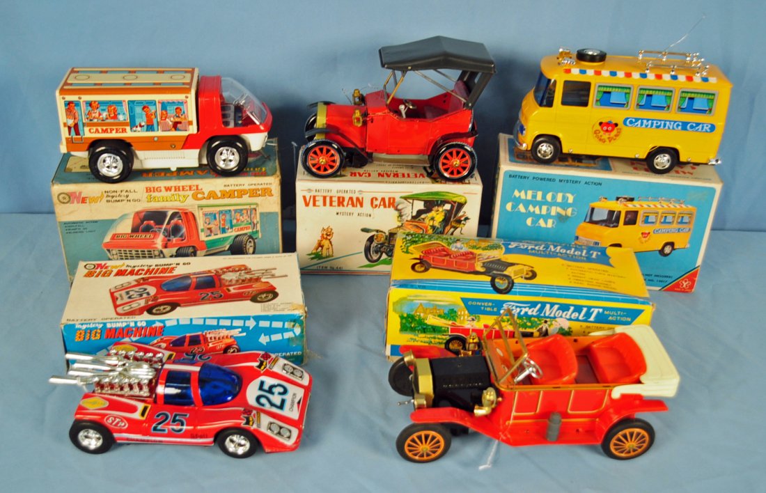 5 Battery Operated Vehicles 1950's & 1960's: 5 Battery Operated Vehicles 1950's & 1960's Includes Mystery Bump'n'Go Big Machine, Melody Camping Car, Big Wheel Family Camper, Veteran Car, and Kraftoy Ford Model T. Condition - when tested, did not