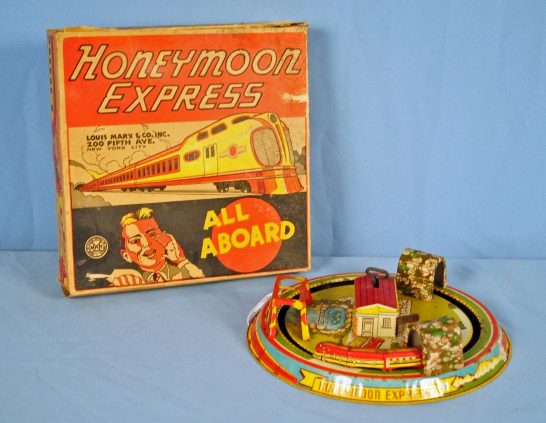 Marx Honeymoon Express Tin Wind-Up Toy 1948: Marx Honeymoon Express Tin Wind-Up Toy 1948 with box. Condition - Train runs and has some surface rust. Box is in fair condition.