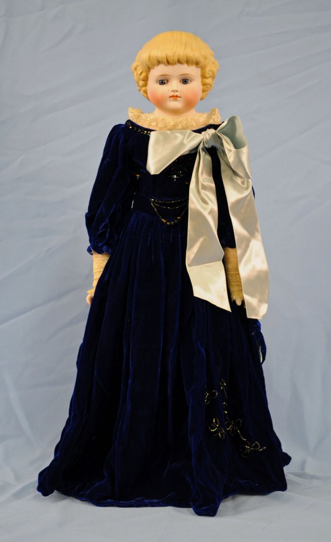 Rare 22.5" Parian Head Doll in Blue Velvet Dress: Rare 22.5" Parian Head Doll in Blue Velvet Dress Features blue velvet dress, blue set eyes, blonde hair, and closed mouth. Doll is marked "1000x10". Condition - Light stains on undergarments, bottom o