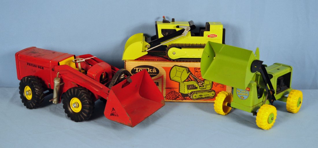 3 Steel 60s Toys Tonka Dozer, Marx & Nylint Loader: Three 1960`s Pressed Steel Construction Toys. Tonka Pressed Steel Dozer in the original box & Marx Lumar Pressed Steel Hi Lift Loader, Both Are in A Rare Green Color. Nylint Hough Payloader in red and
