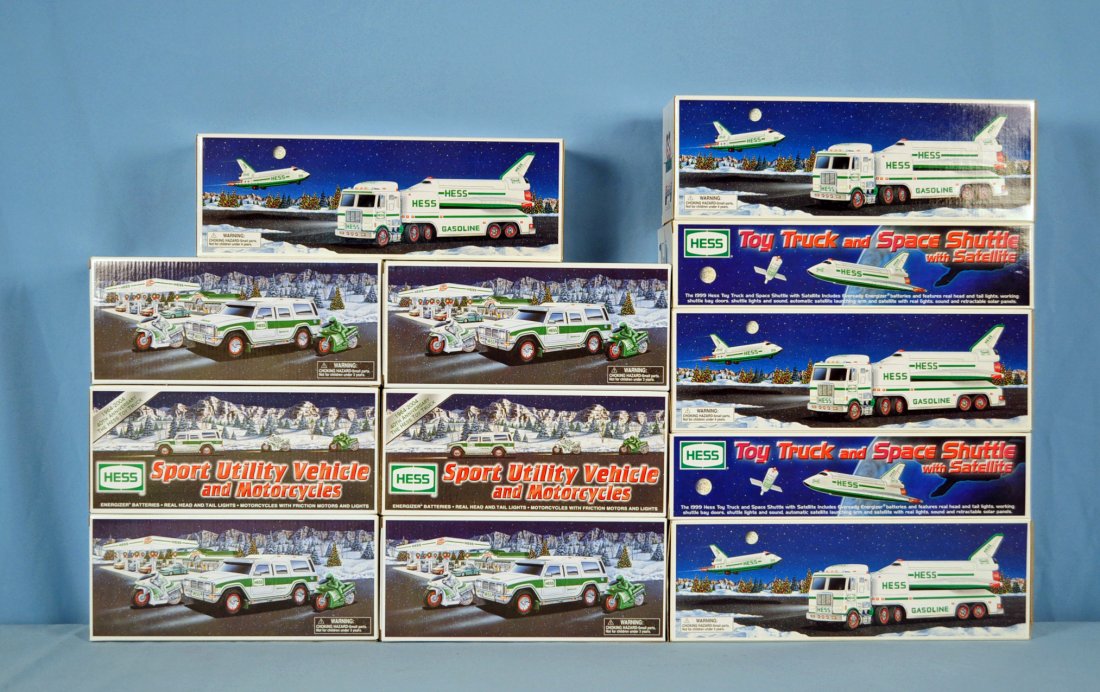 2 Original Cases of Battery Op. Hess Trucks: 2 Original Cases of Battery Op. Hess Trucks Includes: Six 2004 Hess Sport Utility Vehicles w/ Motorcycles, brand new in box, boxes in original shipping case labeled "Hess" on side. Six 1999 Hess Toy T
