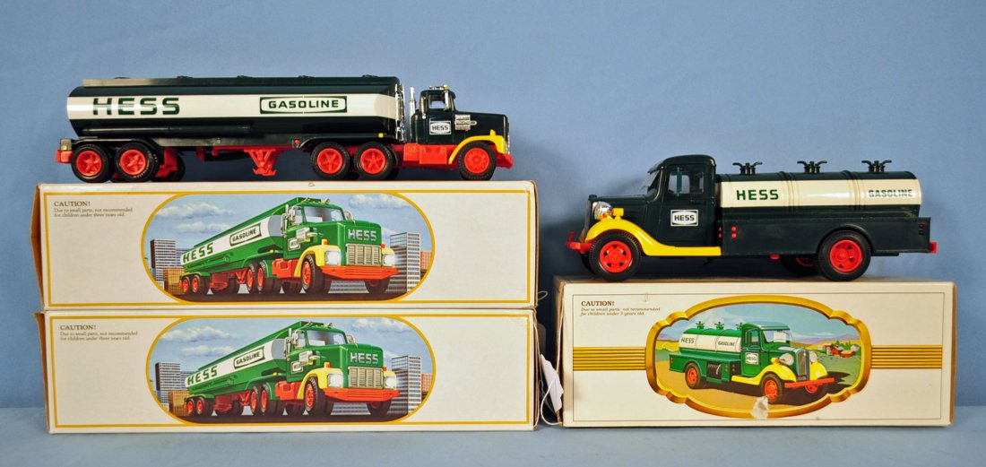 1984 - 1987 Hess Tanker Trucks: 1984 - 1987 Hess Tanker Trucks Includes two Hess "Toy Truck Banks" and one Hess "The First Hess Truck". Condition - all three trucks mint in box.
