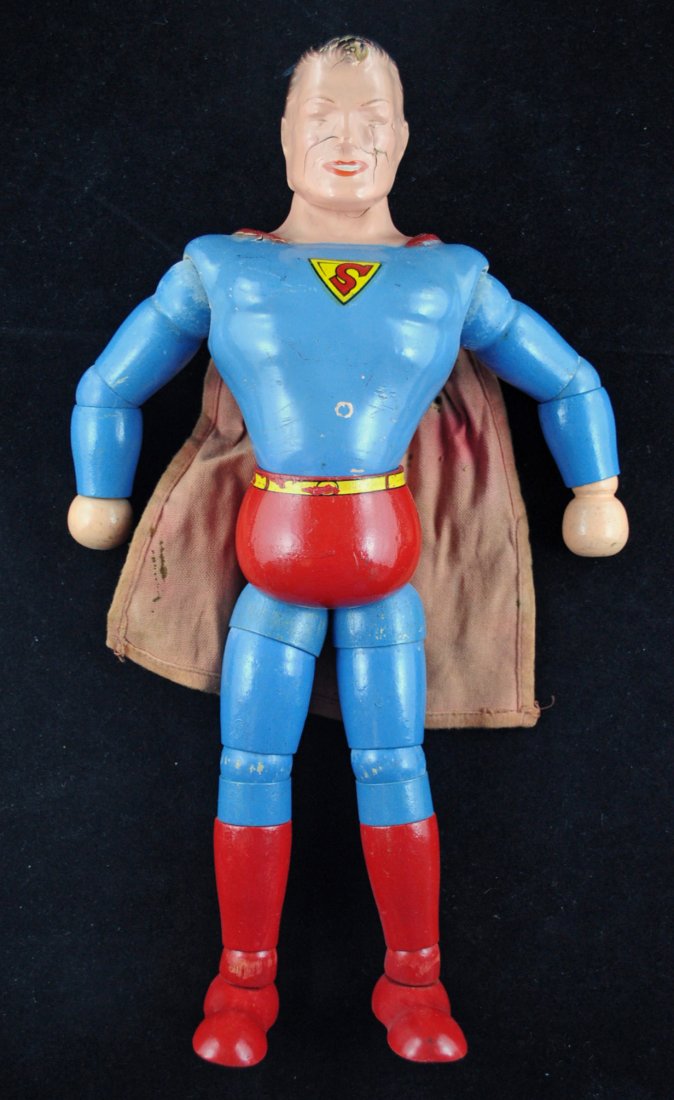 Composition Ideal Jointed Superman Figure: Circa 1940 Composition Ideal jointed Superman figure marked copyright by Superman Inc. made by the Ideal Novelty & Toy Company. Its dimensions are approx. 12.5"H. - Condition: Cape has faded and has s