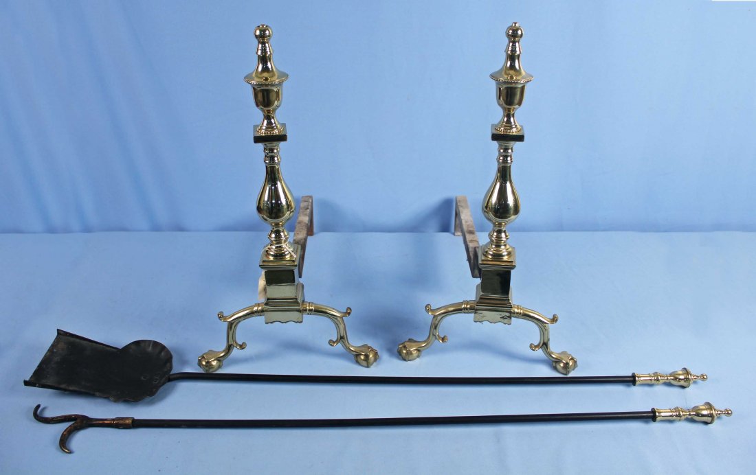 Pair of 20th Century Federal Brass Andirons: Pair of 20th Century Federal Brass Andirons with Claw & Ball feet. 24.5" H. X 22.25" D. X 13" W. Condition - Good condition.
