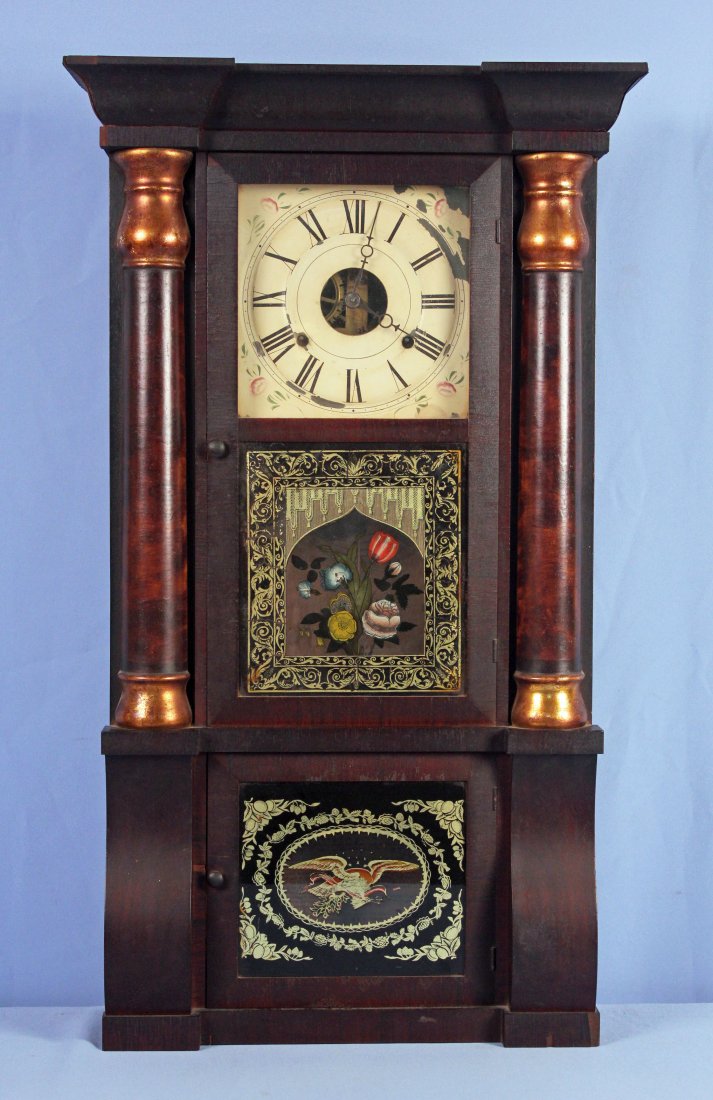 Seth Thomas Triple Tier Shelf Clock w/ Eagle: Seth Thomas empire mahogany triple tier shelf clock with eagle. Clock has reverse decorated doors, lower door with eagle. Has a paper label inside the clock eight day brass clocks that reads the follo