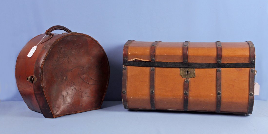 19th Century Jenny Lind Trunk & Leather Hat Box: 19th Century Jenny Lind Trunk and Circa 1900 Leather Hat Box. Trunk is covered in simulated leather and does not have a tray. Leather hat box is marked M.M. Rowe and is 17.5" in dia. Trunk measures 27