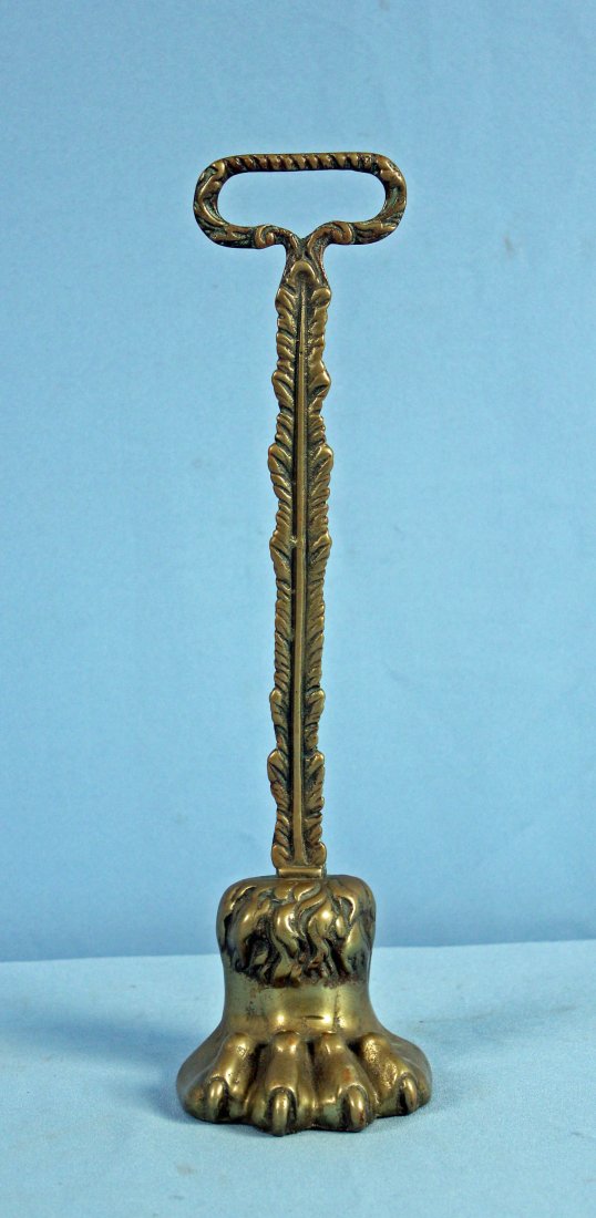 Claw Foot Late19th C. Brass Door Stop w/ Handle: Claw Foot Late19th C. Brass Door Stop w/ Handle. A English brass weighted claw-foot door stop with handle. Circa 1890. England. 14.75" H. X 4". - Condition: Good Condition