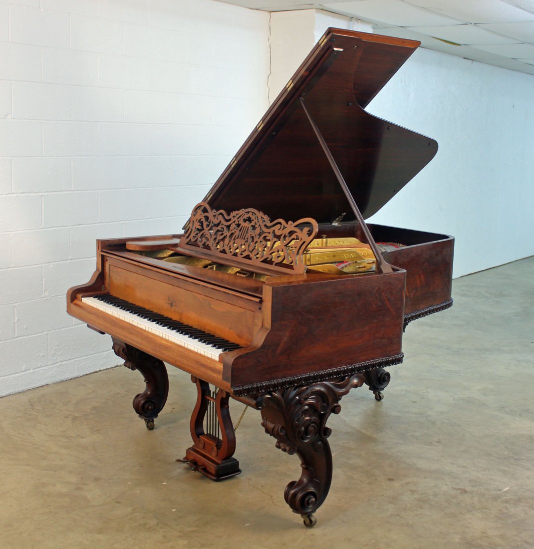Webber New York Rosewood Grand Piano: Webber New York Rosewood Grand Piano. Serial No. 17388. Piano has beautiful scroll legs and antique gold finish inter components. The piano has a very nice sound when played. Piano measures 6' 3.5" lo