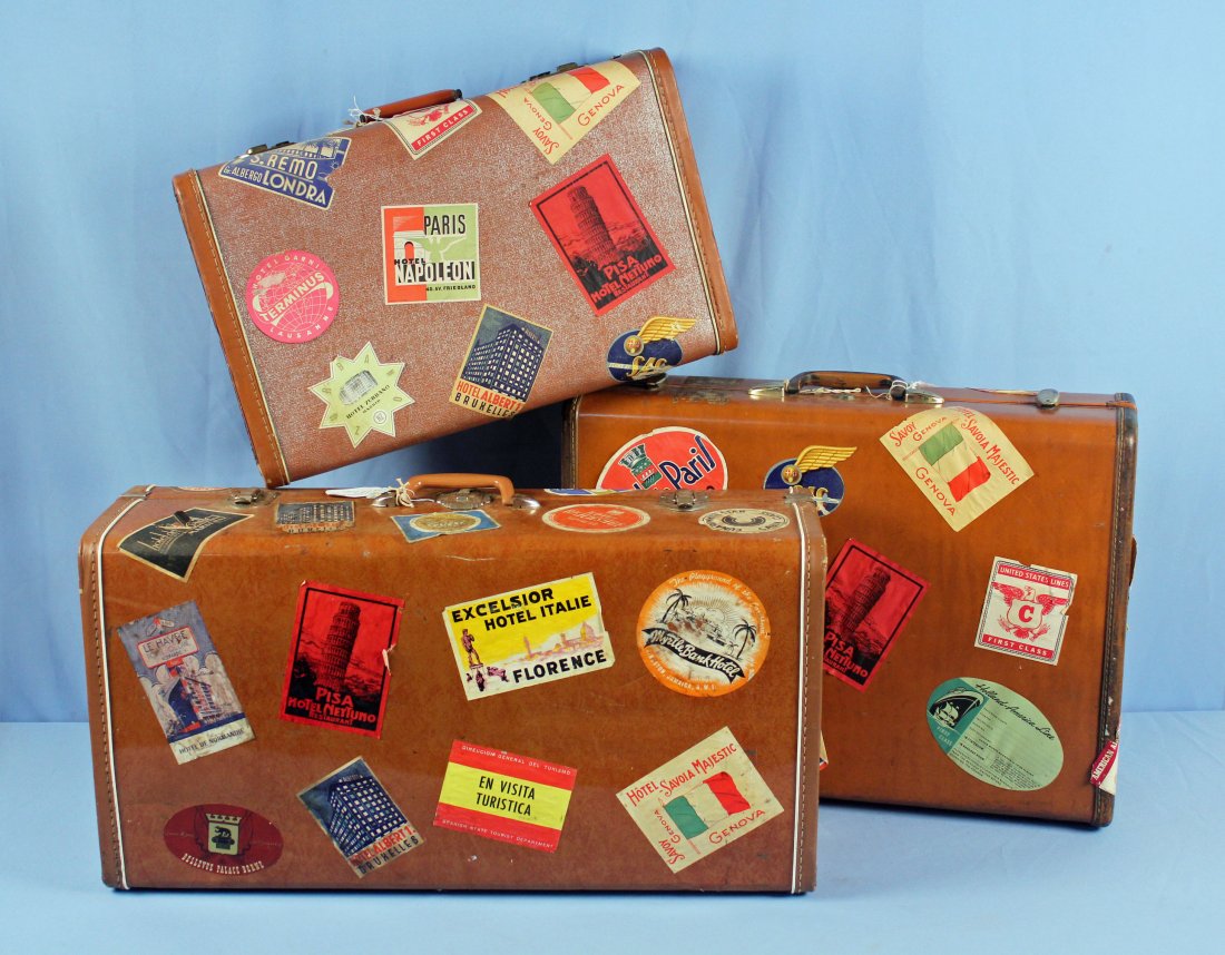 3 Pcs. Vintage 1940s Luggage w/ Travel Tags: Three pieces of vintage 1940s luggage with travel tags. Cases are imitation leather and cloth with leather corners.