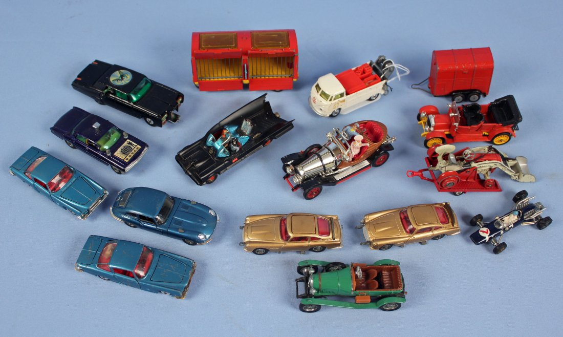 17 Corgi Vehicle Toys Green Hornet Batmoblie Etc.: 17 Corgi Toys vehicles. Group includes Green Hornet car, Batmoblie, Man From U.N.C.L.E. "Chitty Chitty Bang Bang" car, two James Bond Austin Martin cars, etc.