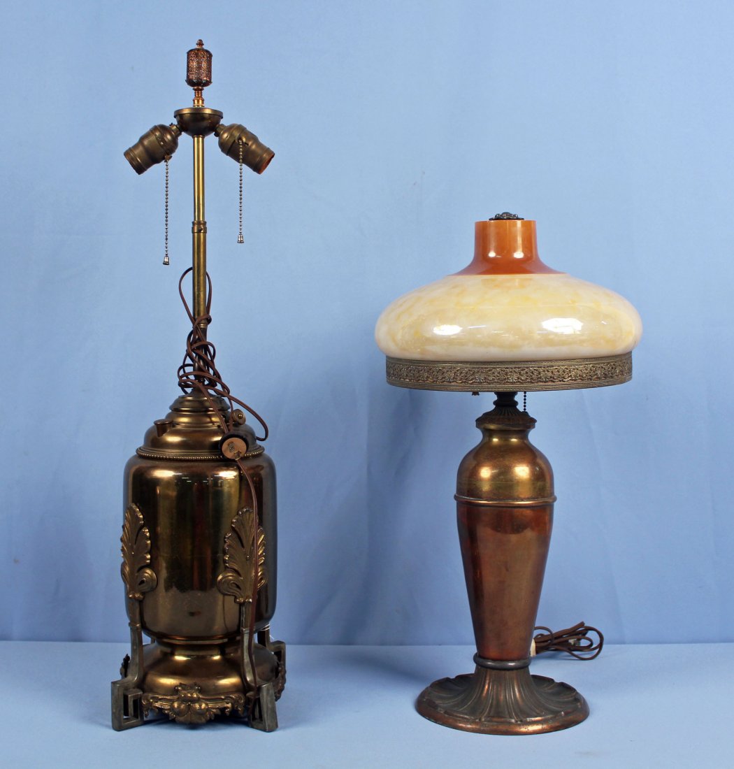 Two Brass Electric Lamps including Miller Co.: Two Brass Electric Lamps Miller Co. 23" High and Bradley and Hubbard style lamp 28" High . Lot includes an iridescent floor lamp shade 12" Dia..