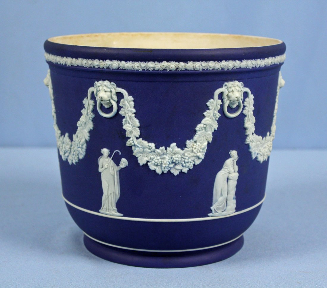 Large Wedgewood Jasperware Jardiniere: Large Wedgewood Jasperware Jardiniere 7.12" High X 8" Dia. Satin blue with white decoration.