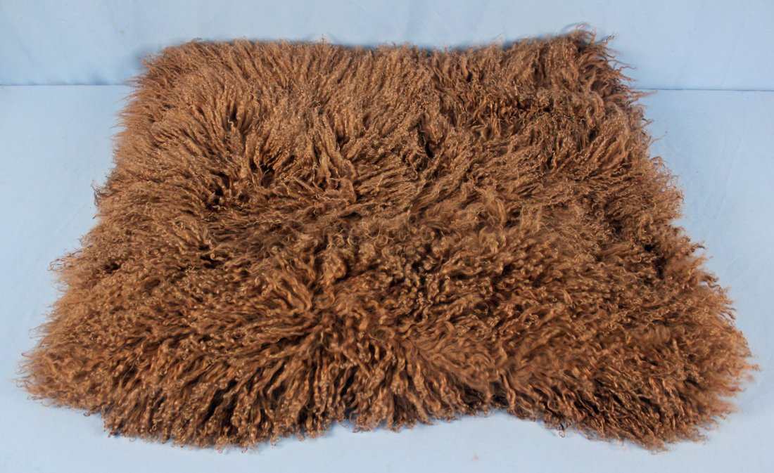 Marlo Lorenz Mongolian Thro 100% Wool Throw: Marlo Lorenz Mongolian Thro 100% Wool Throw. Throw is chocolate color with faux suede back 100% polyester, dry clean only. Measures - 50" X 60"
