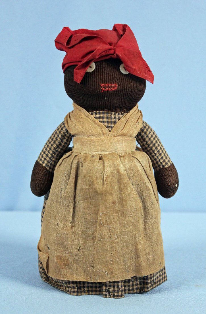 C. 1920 Black Mammy Bottle Doll or Door Stop: Circa 1920 Black Mammy Bottle Doll or Door Stop. Measures 9.5" High.