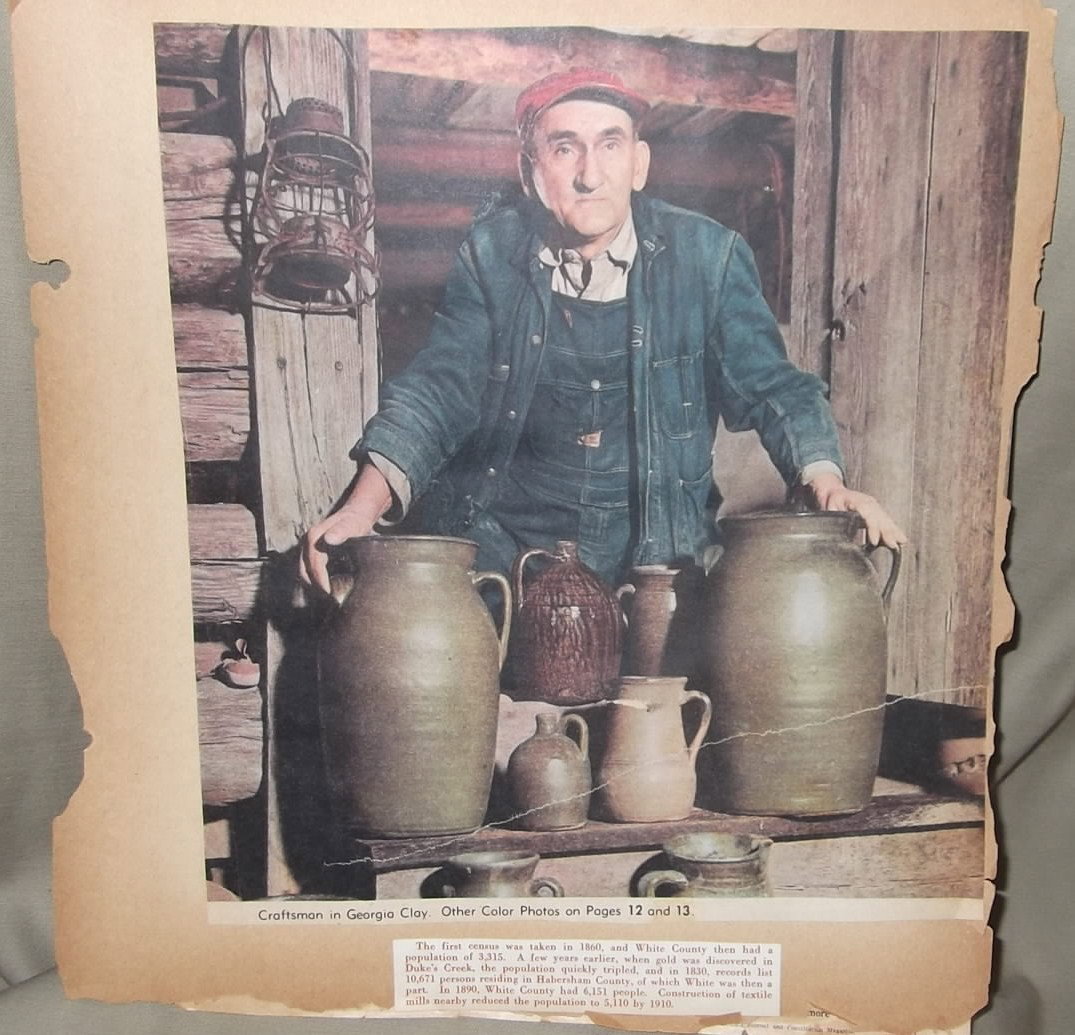 Cheever Meaders clipping: 1970's AJC newspaper clipping of Cheever Meaders showcasing his pottery. It is attached to a page from a scrapbook