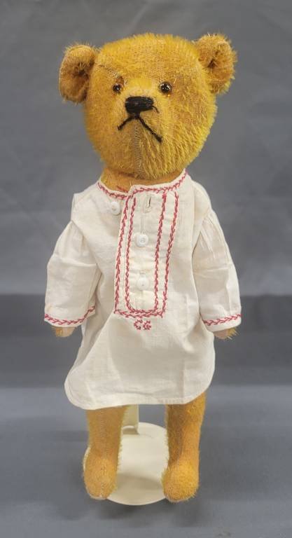 Early Steiff Mohair Jointed Teddy Bear: Early Steiff Mohair Jointed Teddy Bear that has glass eyes and straw stuffed and hole in left ear. Overall in great condition but has wear to the mohair typical of age and original length to mohair. F