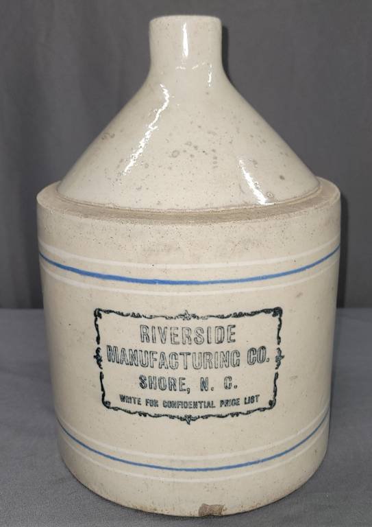 Rare Riverside Manufacturing Co. Shore NC 2gal Jug: Rare Riverside Manufacturing Co. Shore NC 2gal Distiller Jug. Scarce example with strong stencil and is bristol body with blue and white bands. Original example and is fresh from a Athens collection. 