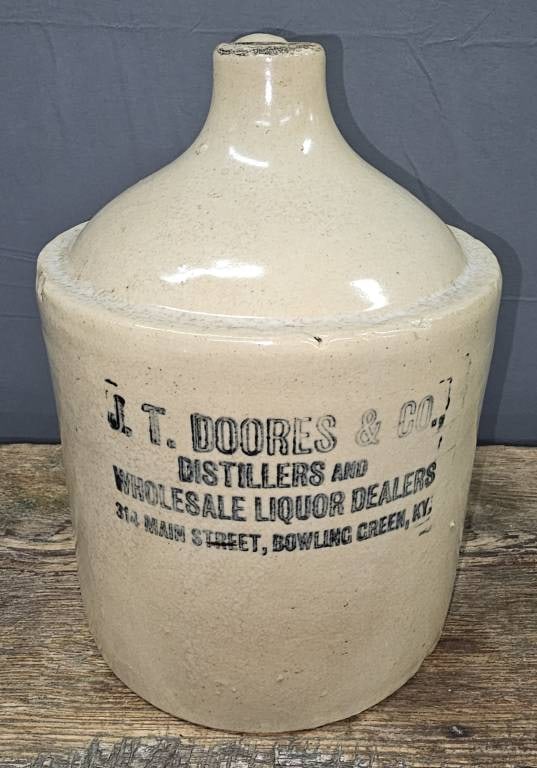 J.T. Doores & Co. Liquor Dealers KY Jug: One gallon J.T. Doores & Co. Distillers and Wholesale Dealers 314 Main Street, Bowling Green, Kentucky Jug. Condition is collector/investment grade with 1 minor base chip. Other than that, no cracks o