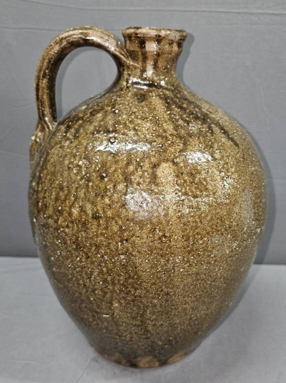 Fine1840's Washington Co. Georgia 1gal Jug: Fine1840's Washington Co. Georgia 1gal Jug. This is an outstanding one gallon jug with earthy rich brown tones with heavy alkaline glaze on one side to a lighter glaze on the other side of the jug. Th