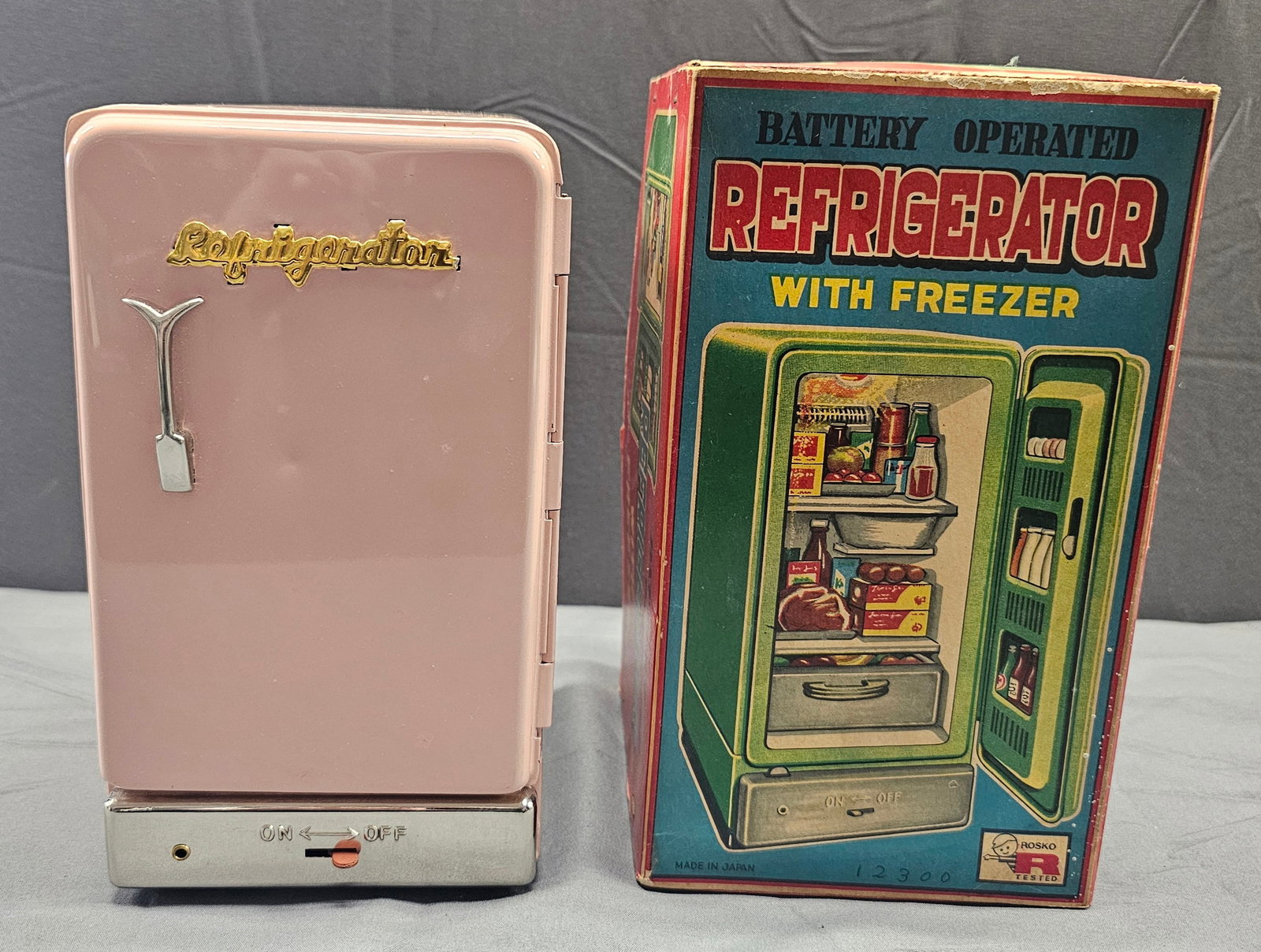 1950s Rosko Japan, Batery Opperated Refrigator Toy: 1950s Rosko Japan, Batery Opperated Refrigator Toy in VG-EX condition with originial box, box is VG condition.