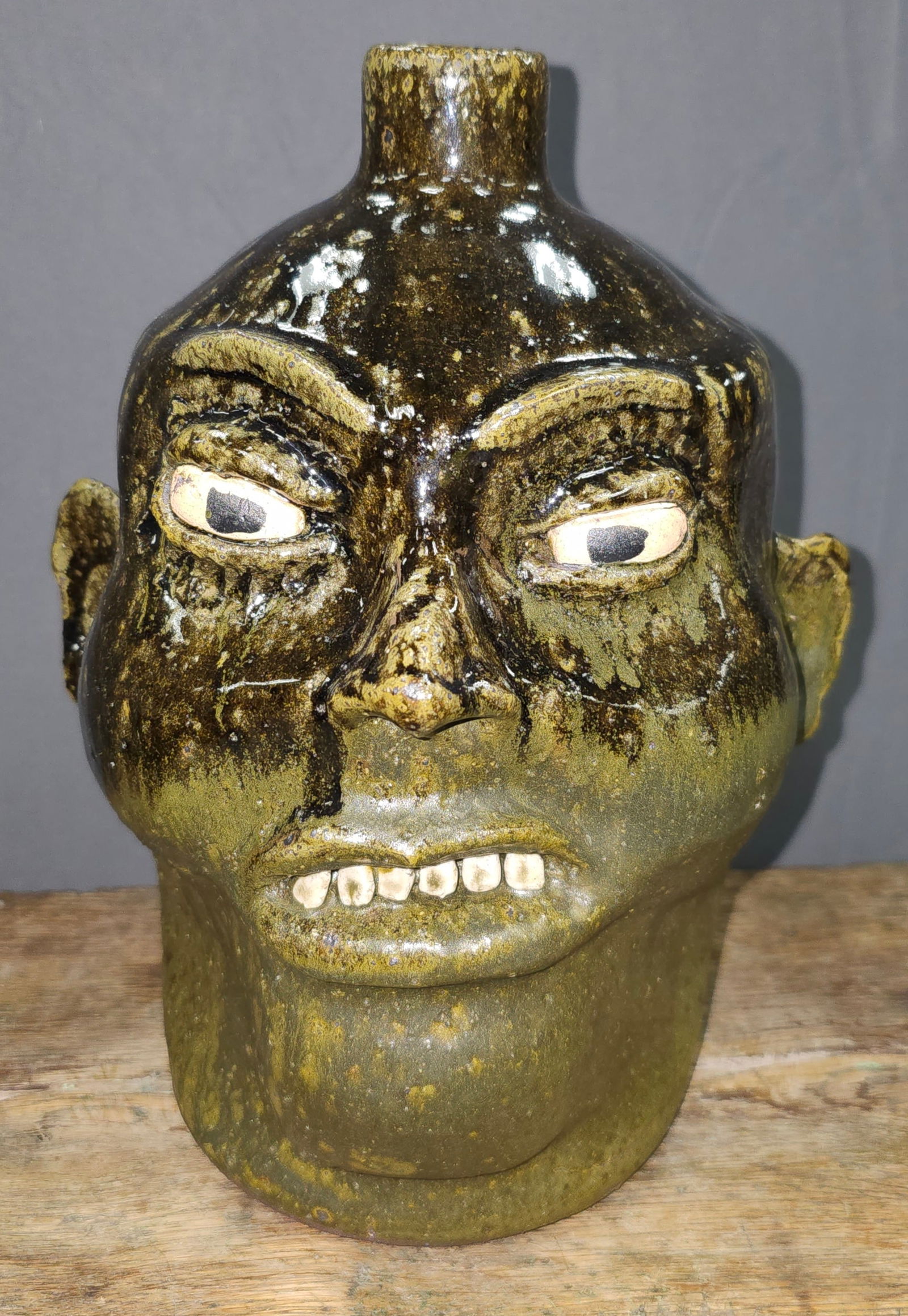 Fine Lanier Meaders Southern Folk Pottery Face Jug: Fine Lanier Meaders Southern Folk Pottery Face Jug. This is one of the best glazed examples I think one could want. This one has a great two tone alkaline glaze and a outstanding facial expression. Th