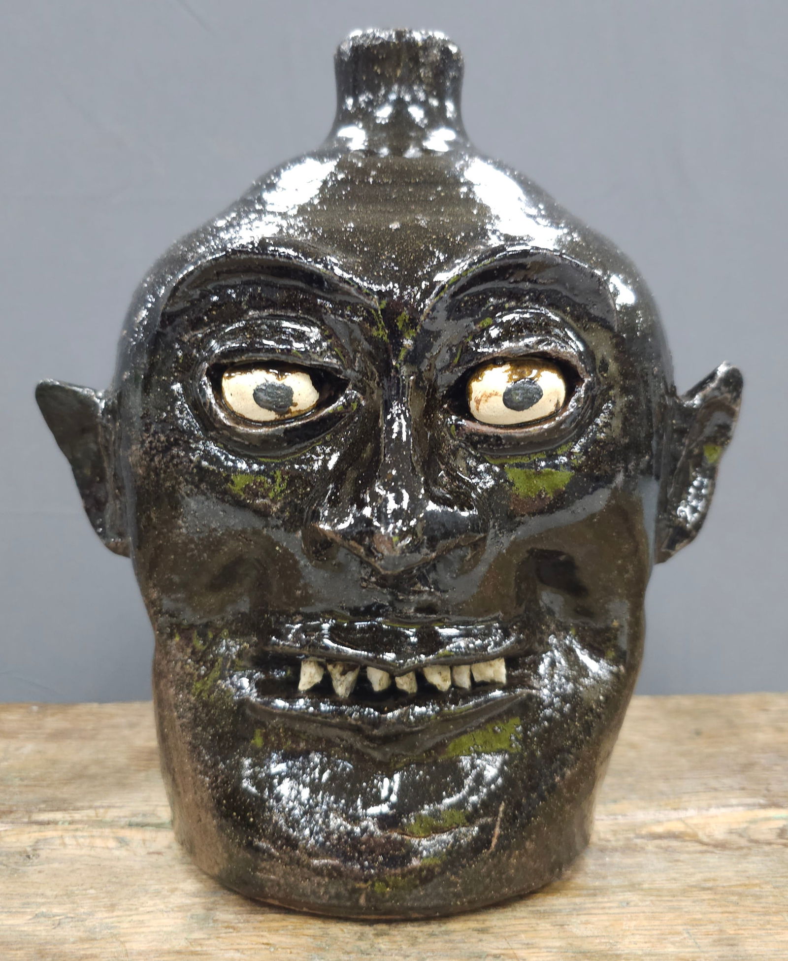 Lanier Meaders Early Period Rock Tooth Face Jug: Signed Lanier Meaders (1917-1998) Early Period Rock Tooth Face Jug. Outstanding example of a Southern Folk Pottery, the facial features and expression are just outstanding. Classic early period eyes,