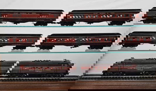 Lionel Post War GM & O F3 Engine & Passenger Set: Lionel Post War Gulf Mobile & Ohio F3 Engine & Passenger Set. AB and 4 Lighted passenger cars made by Williams. Refinished Tinplate, R-9