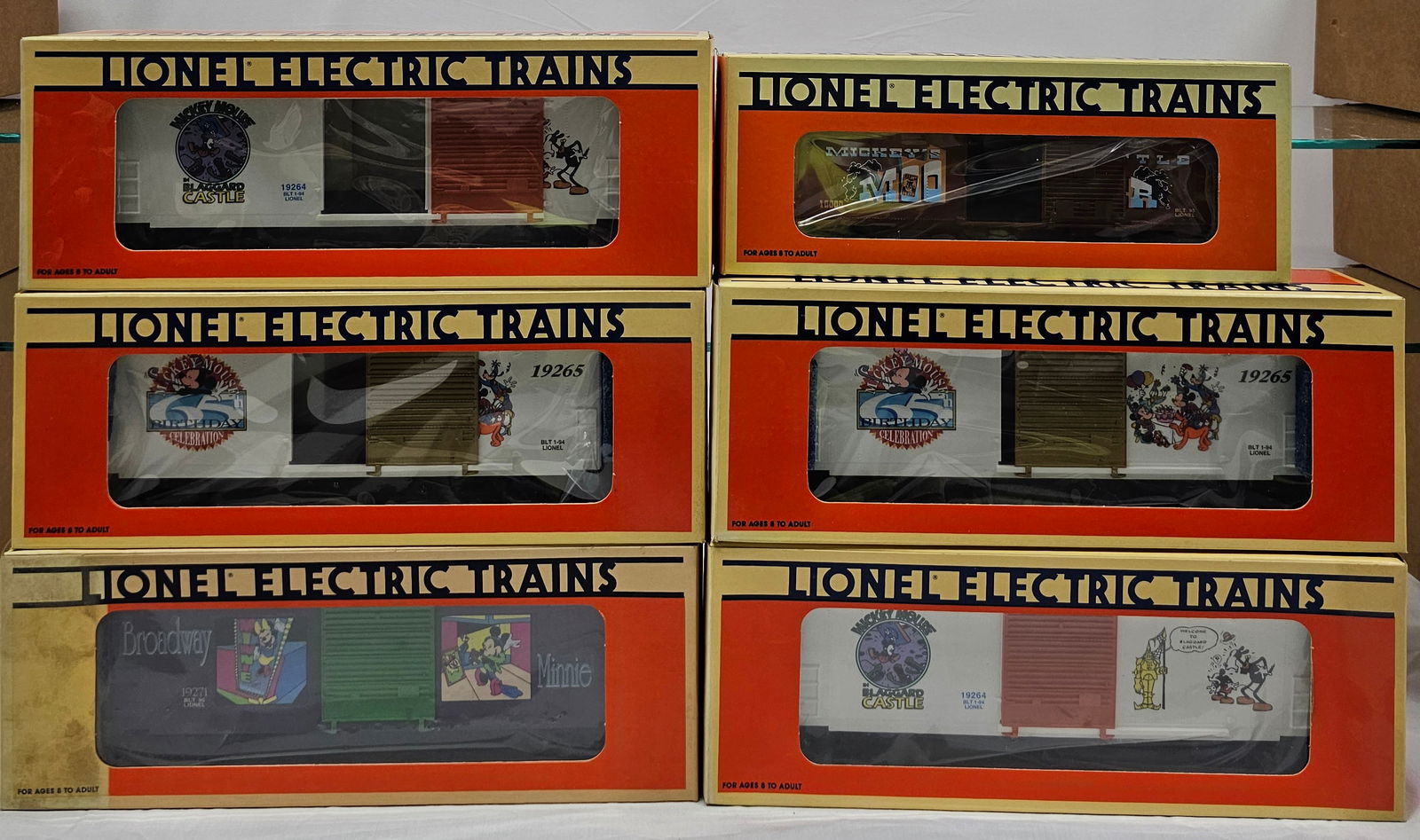 Lionel Disney Box Car Lot of 6 (NIB) C-10: Lionel Disney Box Car Lot of 6 (New In Box) C-10. 1. 6-16686, Mickey Mouse & Bad Pete Animated Boxcar. 2. 6-19265 x2 Mickeys 65th Birthday Hi Cube Boxcar. 3. 6-19264 x2 Perils of Mickey Boxcar. 4. 6-1