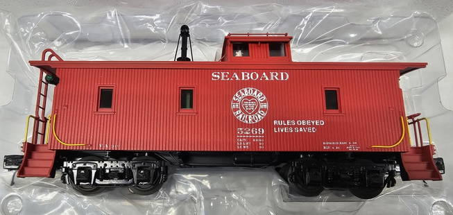 MTH Seaboard CA-1 Woodsided Caboose& C&O Caboose: MTH Seaboard CA-1 Woodsided Caboose & C&O O-Scale Extended Vision Caboose lot of two. Both are in C-8+ condition. 1. C&O O-Scale Extended Vision Caboose, MT-9102L.2. Seaboard CA-1 Woodsided Caboose, 2