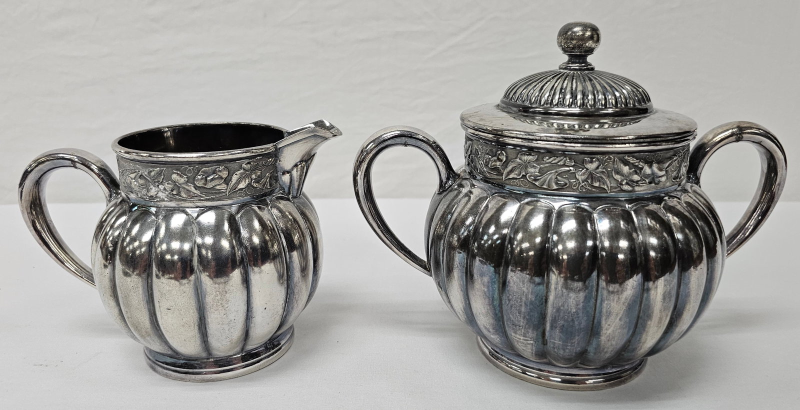Wilcox Quadruplate Silver Plate Creamer & Sugar: 1870's Wilcox Quadruplate Silver Plate Creamer & Sugar in collector grade condition. Signed on base. Size: C- 4 1/4" T & S- 5 7/8" T