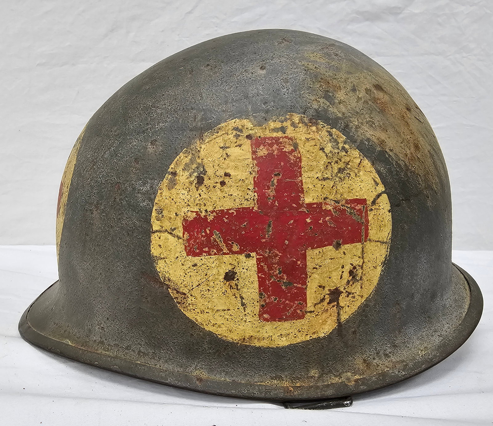 US M1 Swivel Bail Medic Helmet: US M1 Swivel Bail Medic Helmet in original state with original paint graphics.