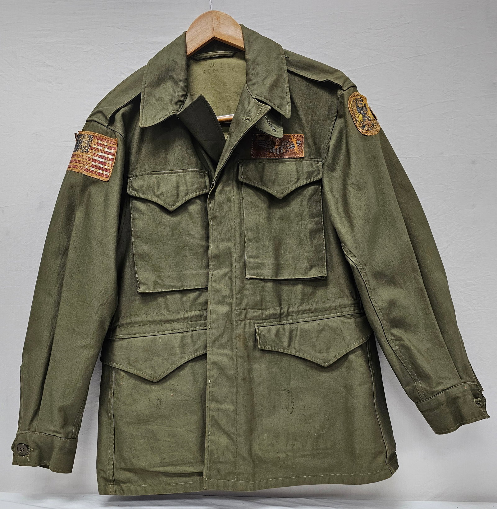 WWII M-1943 Field Jacket 15th Air Force Pinup: Fine and Rare Original WWII 15th Air Force Bombardier "Sweet Lorraine" Pinup Painted M-1943 Field Jacket, in original state. "Sweet Lorraine" was a very popular song during the war time period. This j
