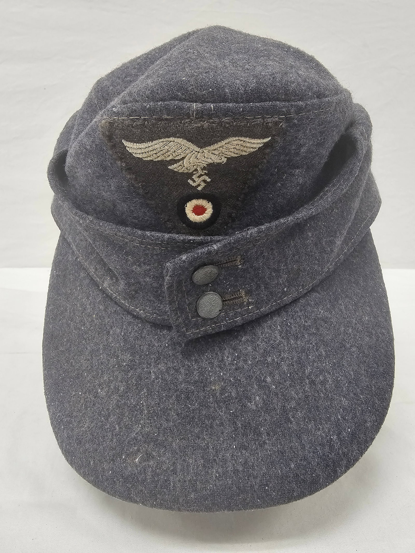 WWII German Luftwaffe M43 Field Cap: Authentic WWII German Luftwaffe M43 Field Cap, in VG good condition. No moth damage. Marked inside see pictures.