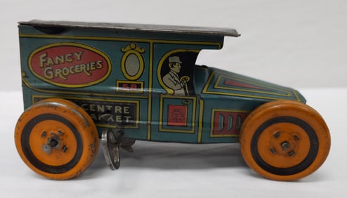 1927 J. Chein Fancy Groceries Tin Litho Windup Toy