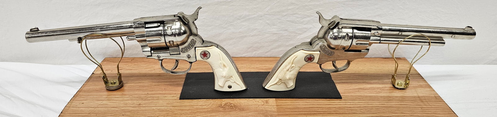 Hubley Cowboy Cap Lot of 2 (NOS): Fine Hubley Cowboy Cap Lot of Two (New Old Stock) a pair of collector grade and is in unfired condition. Collector grade examples.