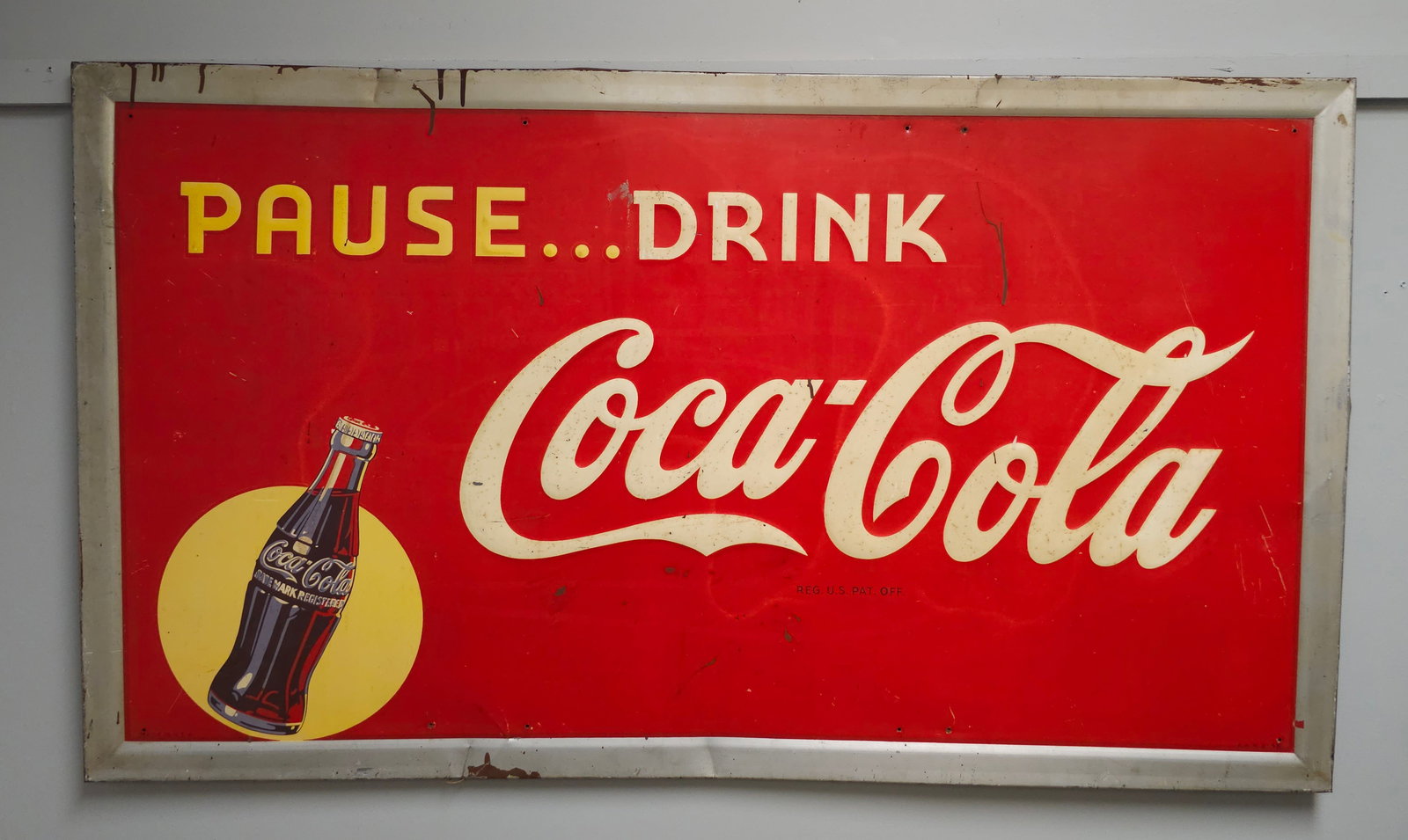 1941 Pause... Drink Coca Cola Advertising Sign: Authentic 1941 Pause... Drink Coca Cola Advertising Sign in great original condition, C-7.5+. AAW 8-41 Made in USA. Size: 56" x 32 1/4"