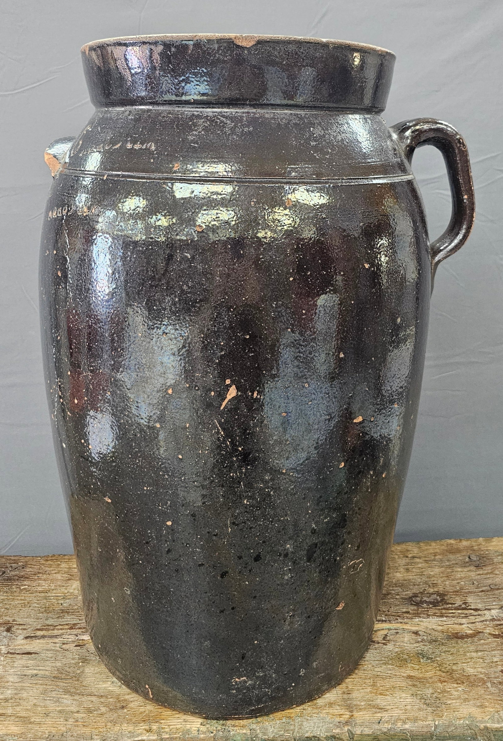 6gal Signed WTB Gordy Slip Glazed Churn: Six Gallon Signed WTB Gordy Slip Glazed Churn, both WTB Gordy stamps are upside down. This is a great early example and hard to find six gallon capacity. This example has a few normal wear chips, noth