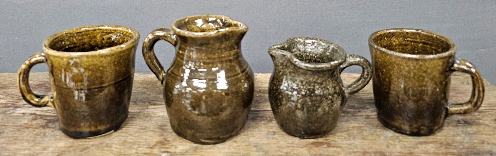 Arie & Lanier Meaders Creamer and Cup Lot of 4: Arie & Lanier Meaders Creamer and Cup Lot of 4 all in collector grade mint condition with no damage or repairs. Standing: (Tallest & Shortest) - 4 1/8" T & 3 1/8" T