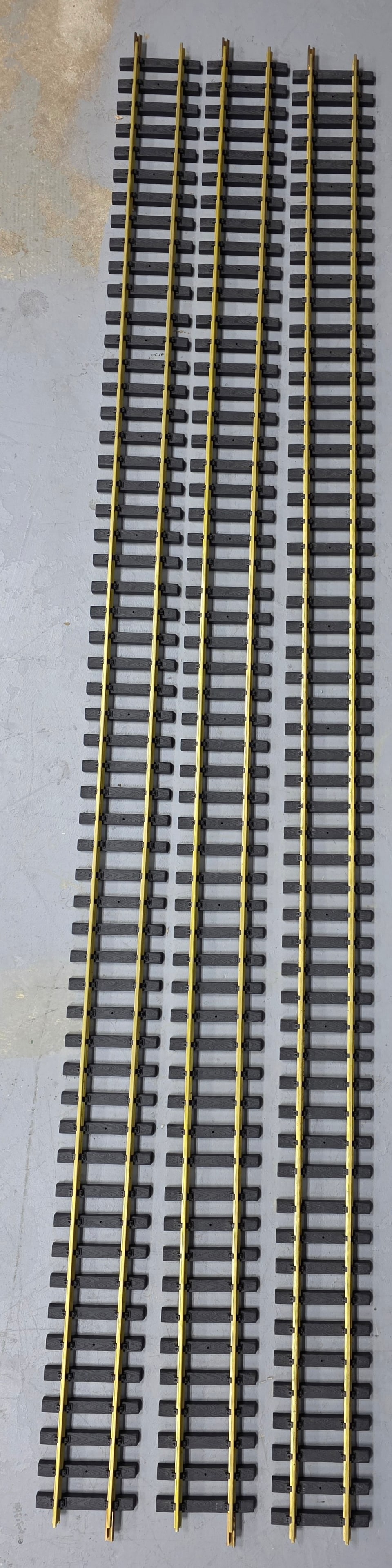 Aristo Craft G Scale Brass Straight Track 60" L: Three pieces of Like New, Aristo Craft G Scale Brass Straight Track 60" Long each for 180" inches of solid brass track.