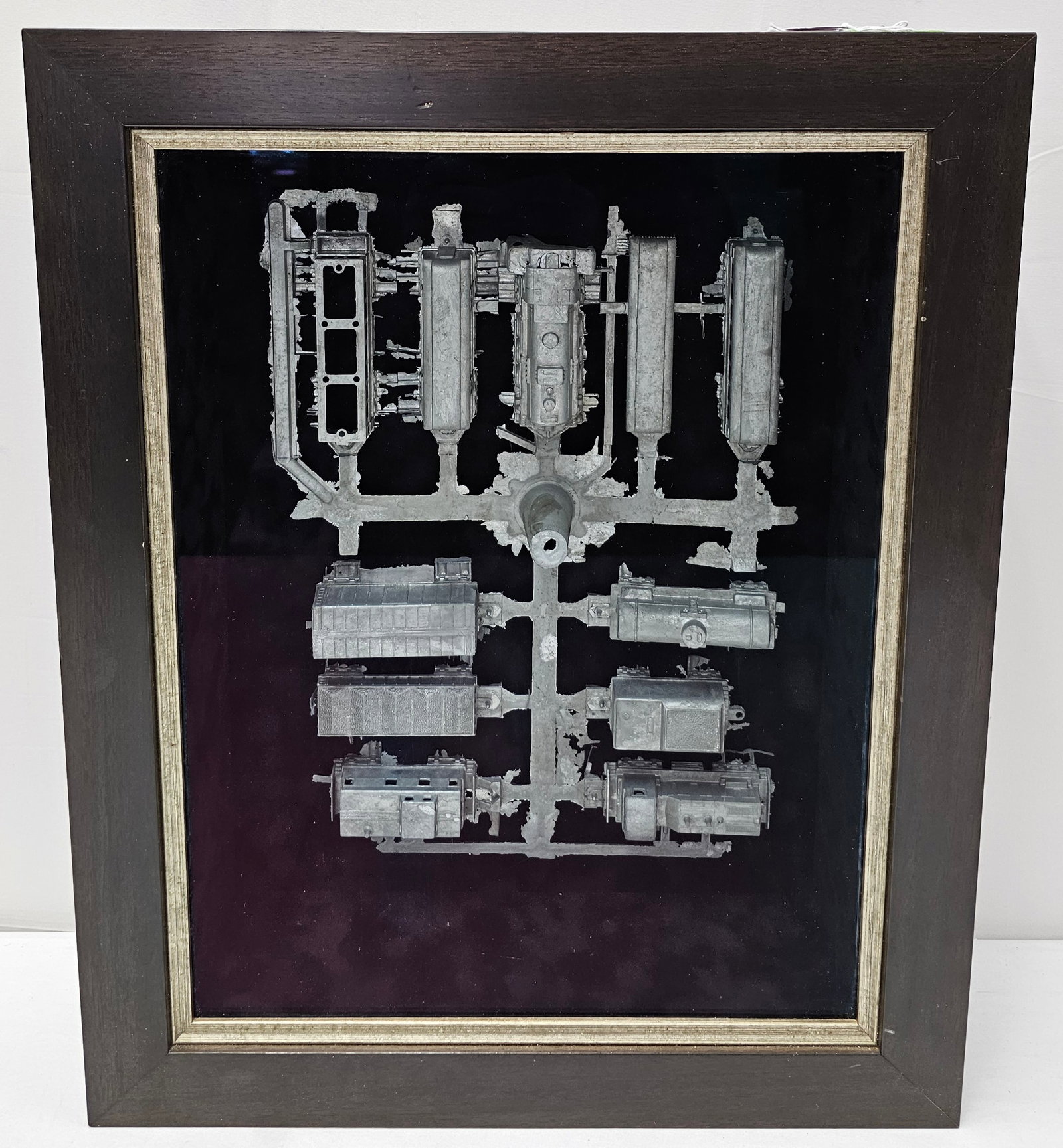Shadow Box of Poured Metal Train Set: Shadow Box of Poured Metal Train Set, like new condition. Has been professionally framed. Size: 19 3/4" T x 16" W x 4 1/2" D.