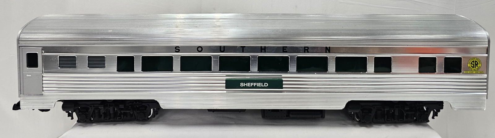 Aristo-Craft Southern "Sheffield" Passenger Car: Aristo-Craft G-Scale 32511 Southern "Sheffield" Aluminum Streamline Passenger Car, C-8+, comes with sound. No box. Aluminum body, illuminated interior, approx. 30" L.