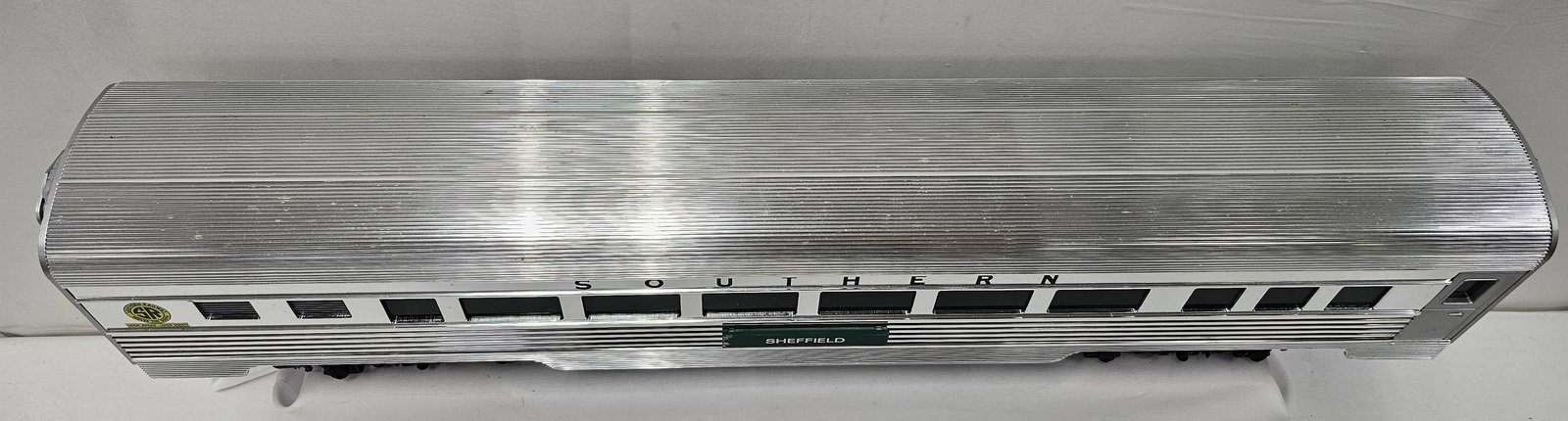 Aristo-Craft Southern "Sheffield" Passenger car: Aristo-Craft G-Scale 32511 Southern "Sheffield" Aluminum Streamline Passenger Car, C-7+, comes with sound. No box. Aluminum body, illuminated interior, approx. 30" L.