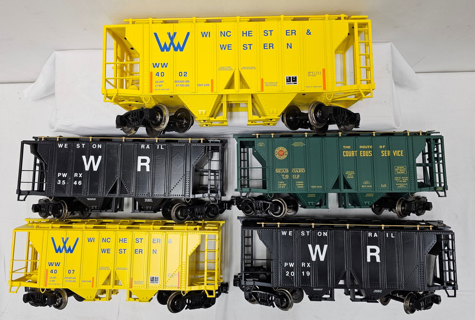 Aristo-Craft G-Scale Covered Hopper Lot of 5: Aristo-Craft G-Scale Covered Hopper Lot of 5, C-8. 1. (x2) Custom Weston Covered Hopper. 2. Seaboard Covered Hopper. 3. (x2) Winchester & Western #4002 Covered Hopper (one has a damaged step rail).