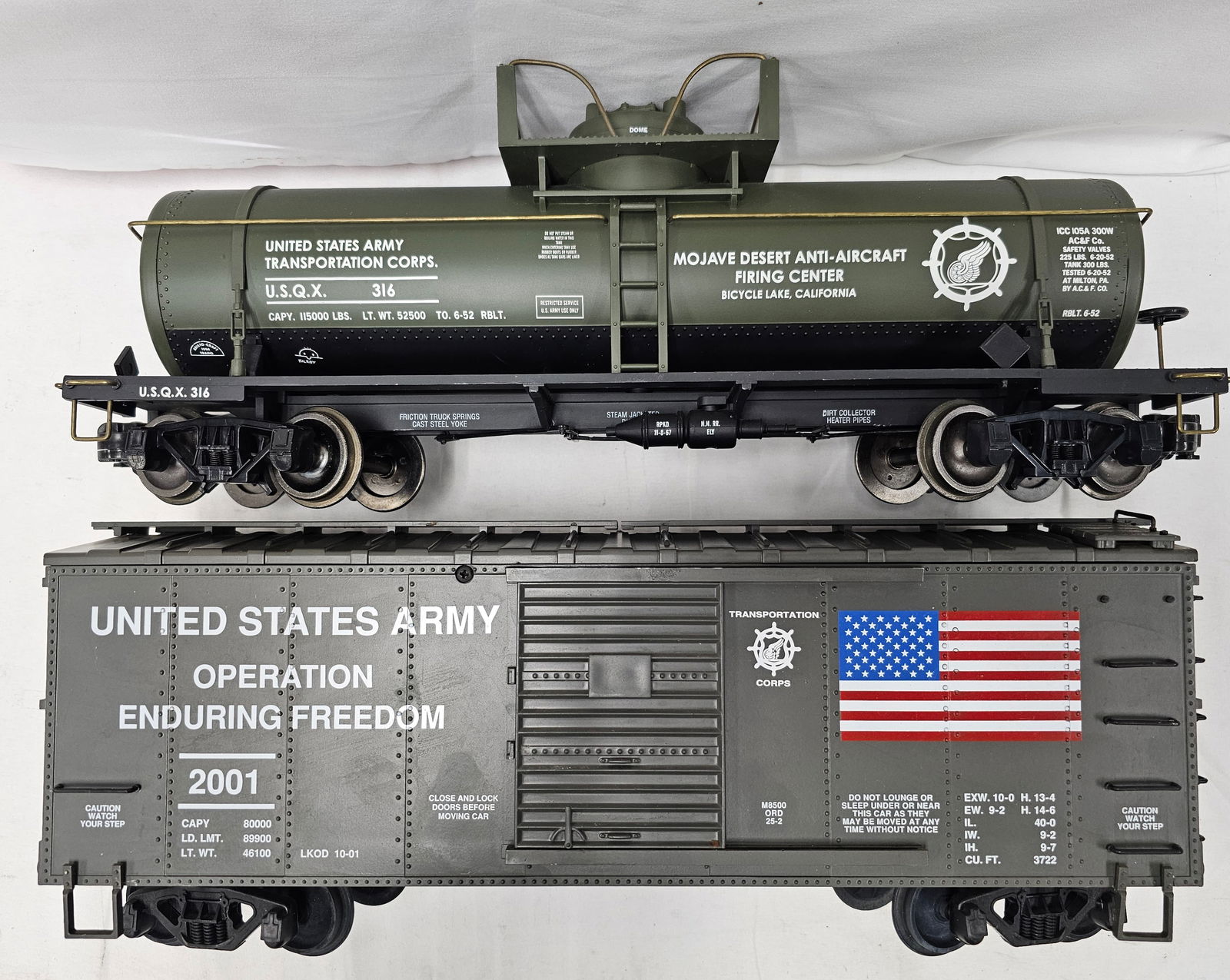 G-Scale US Army Train Car Lot of 2: G-Scale US Army Train Car Lot of 2 1. Aristo-Craft US Army #316 Tank Car. 2. Charles Ro Manufacturing Co. Inc. US Army Boxcar