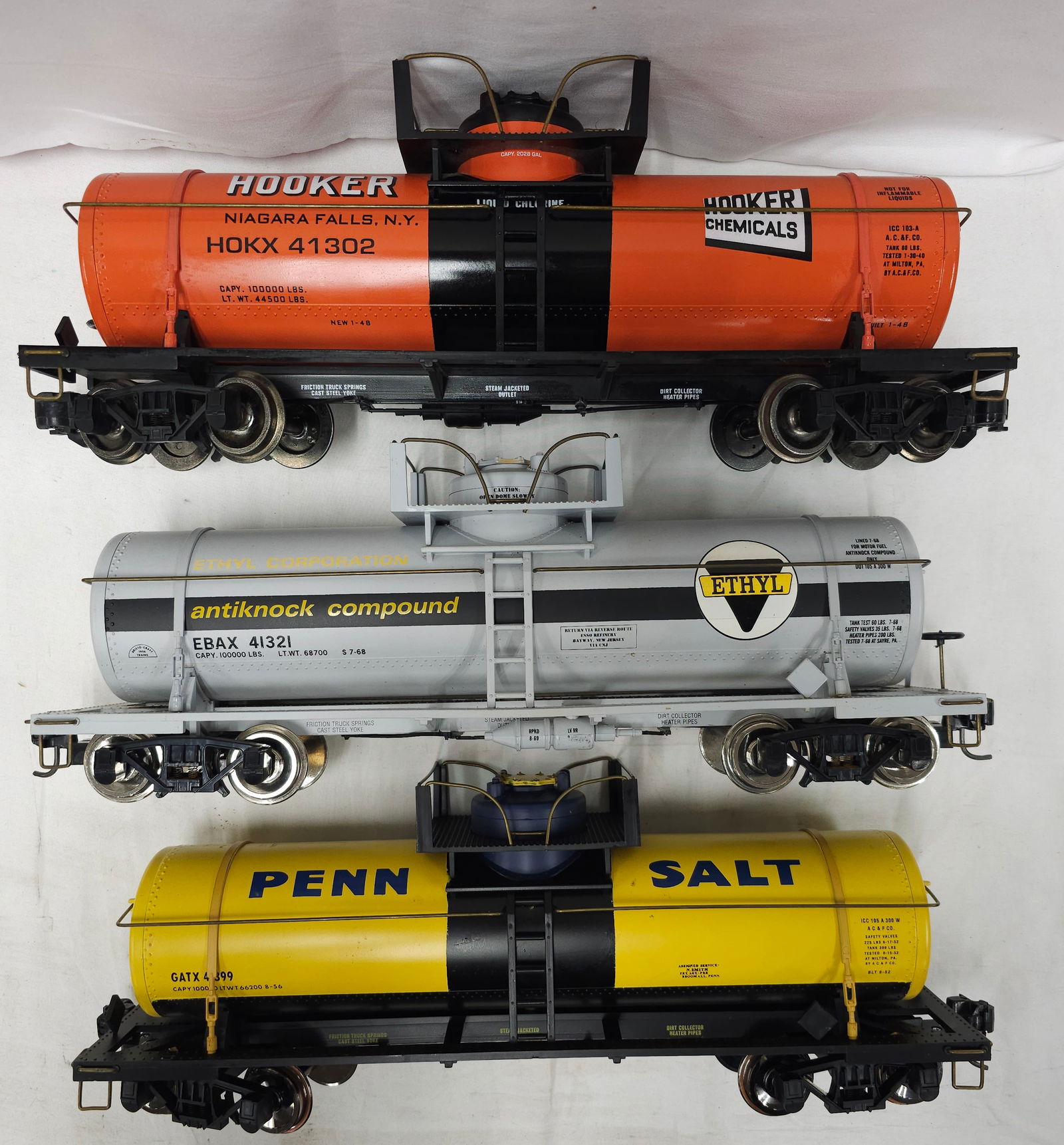 Aristo-Craft G-Scale Tank Car Lot of 3: Aristo-Craft G-Scale Tank Car Lot of 3, C-7-8. 1. Hooker Chemicals Tank Car HOKX 41302. C-8. 2. Ethyl Tank Car 41321, Lightly run. C-7+. 3. Pennsylvania Salt Tank Car 41399. C-7+.