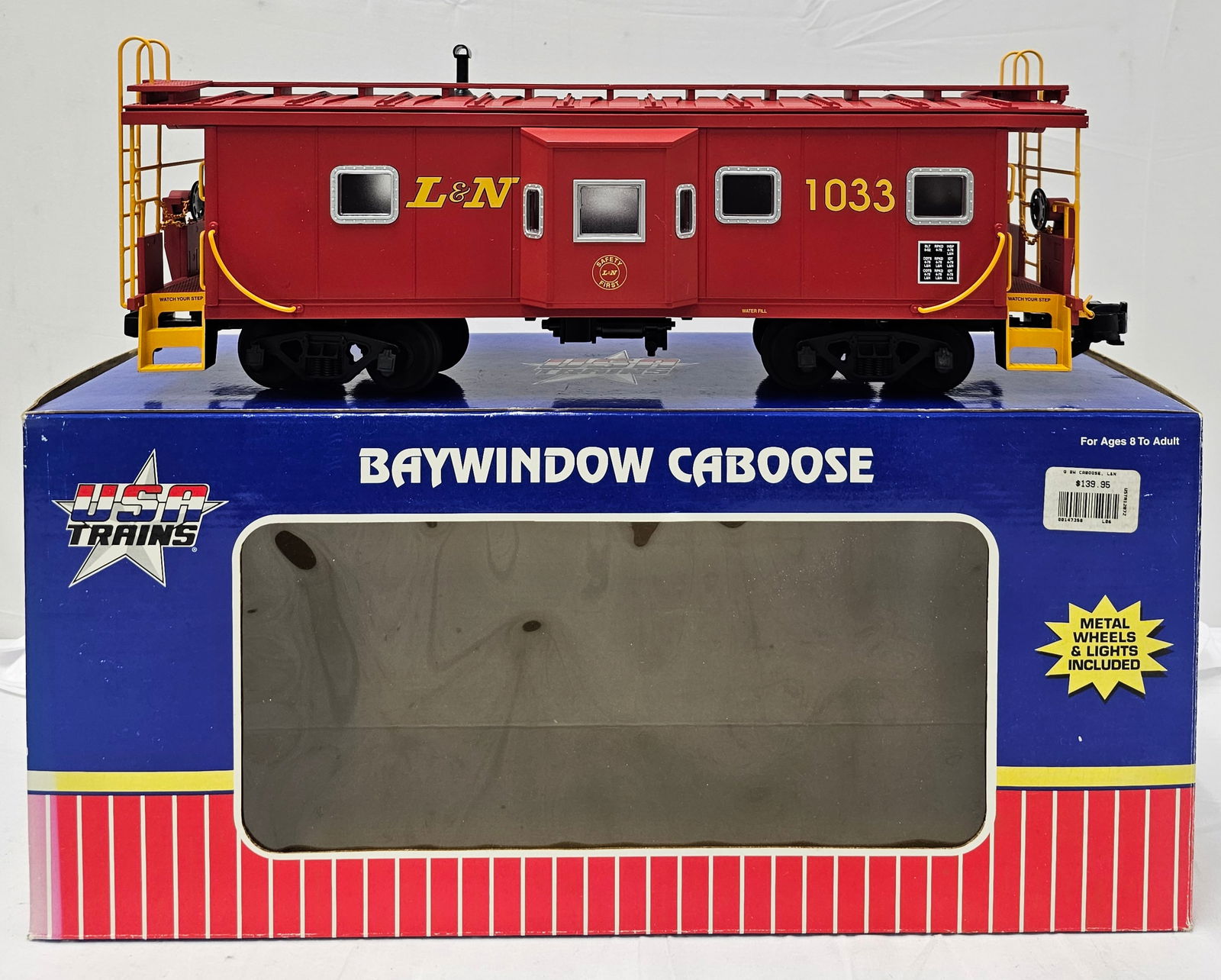 USA TRAINS L & N Bay Window Caboose: USA TRAINS R12072 (#1033) Louisville & Nashville Bay Window Caboose with box. Light run time. C-9