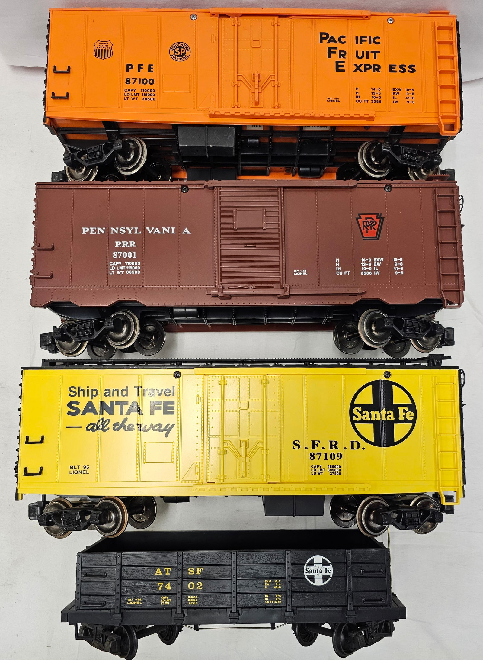Lionel G-Scale Box Car & Gondola Lot of 4: Lionel G-Scale Box Car Lot of 4. 1-UP & SP Union Pacific and Southern Pacific #87100 Pacific Fruit Express Box Car, C-8+. 2- PRR Pennsylvania Railroad #87001 Box Car, C-8+. 3-Sante Fe #87109 Box Car,